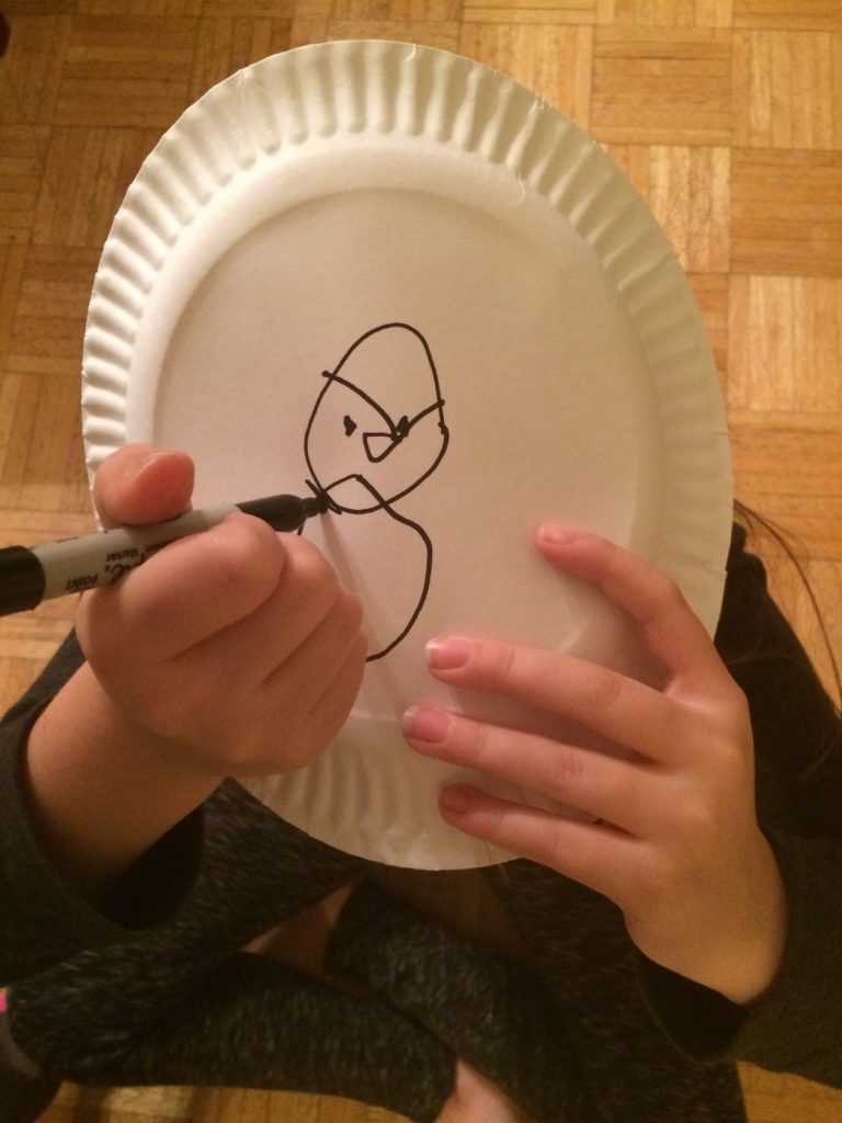 directed drawing game on a paper plate for executive function planning skills