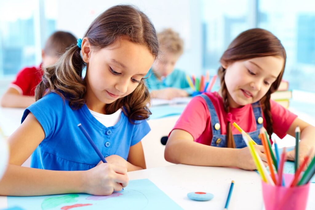 students completing fine motor activities in the classroom